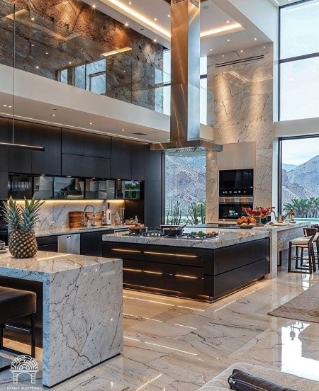 Open-plan kitchen with walnut and stone finishes